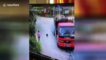 Huge stone falling from overloaded lorry hits passerby