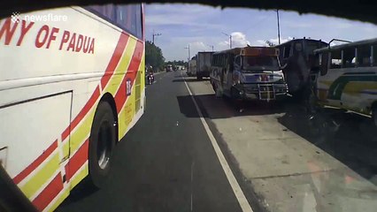 Motorcyclist helmet camera captures terrifying near miss with two over-taking buses