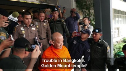 Bangkok: Abbot surrenders to police over funds scandal