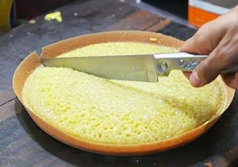 Indonesian Food Vendor Prepares Chocolate Cheese 'Martabak' Dessert