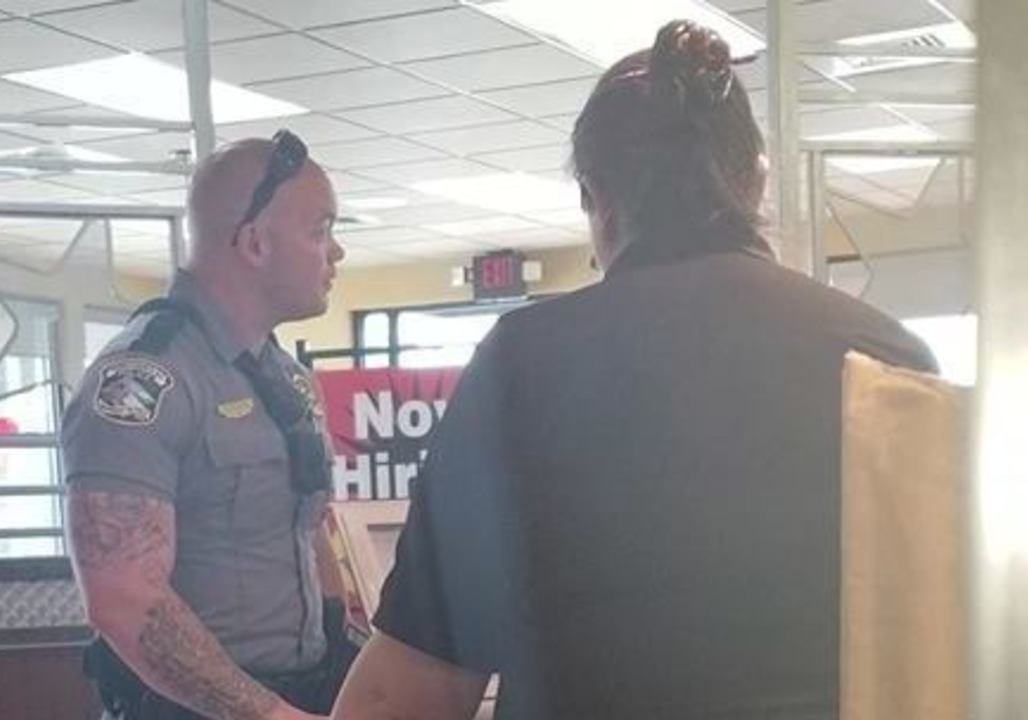 Police Officer Buys Meal for Homeless Man After Being Called to Fast Food Restaurant