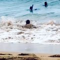Woman Dumped by Wave