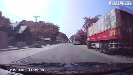 Over-Taking Bus Has Near Miss With Car