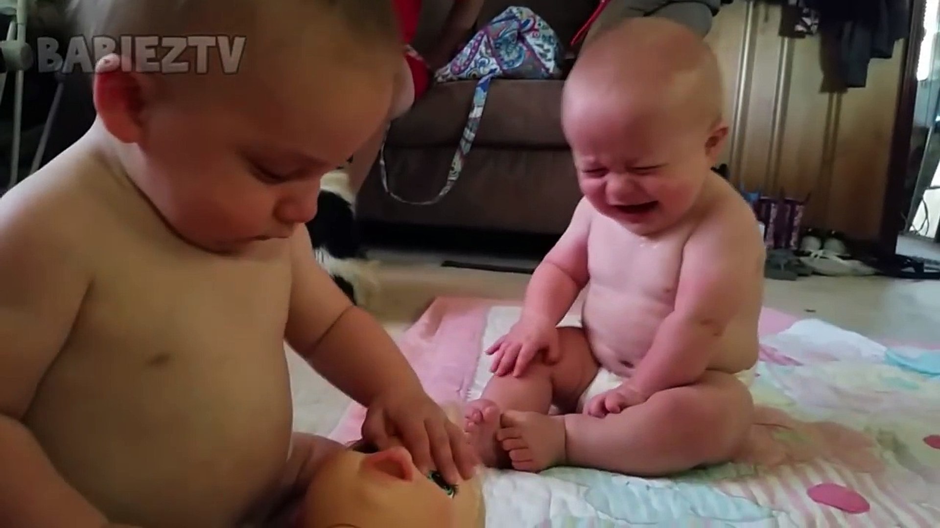 ⁣FUNNIEST TWIN BABIES Fighting over Doll!_HD