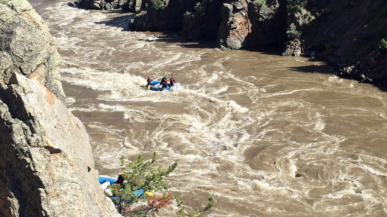 Whitewater Rafting Guides Practice Flipping Raft