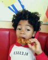 Baby Q of the @tolliverboyz is a fan of the sweet, smoky and #fingerlickingood crispy Smoky Mountain BBQ chicken!