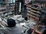 Shopkeeper foils sword wielding robber