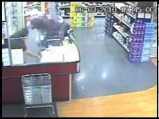 Bungling robber hits shop worker with gun but flees empty handed