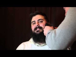 Close Shave for 2013 as man cuts beard for first time in a year