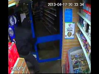 Shopkeeper sees off robber with bottle of Lucozade