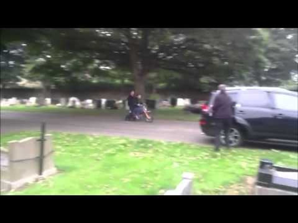 Yobs on a motorbike racing through a Sheffield cemetery to the disgust of mourners.