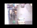 Pensioner knocked unconscious by a falling shop sign.