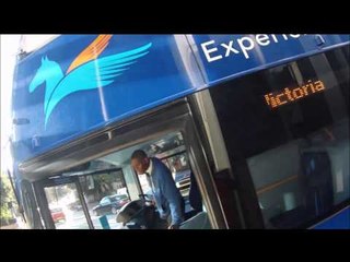 London tour bus mounts pavement to block cyclists