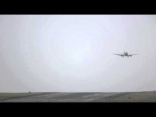 Dramatic moment plane lands SIDEWAYS in high winds