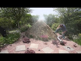 Couple builds replica volcano in back garden