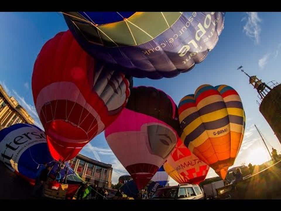 25 Air balloons fly out over Bristol to launch this year's Bristol International Balloon Fiesta.