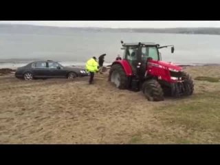 £120,000 Bentley stuck on a beach – had to be rescued by tractor