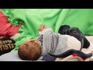 Syrian refugees sleep in Keleti station after Hungary tried to send them to processing camp