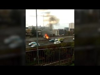Car burst into flames after smashing into barrier