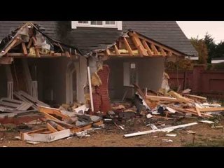 House half demolished after lorry repeatedly rams it