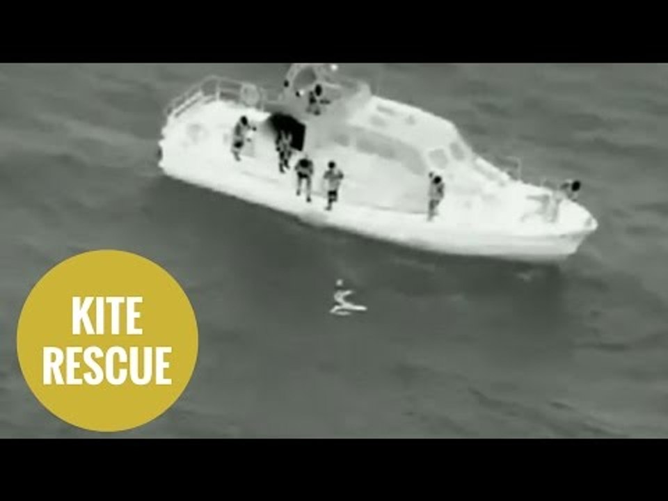 Dramatic rescue of kite surfer who turned kite into makeshift liferaft