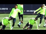 Neymar Kicks Luis Suarez On The Backside During Barcelona Training Session