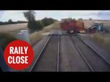 Heart-stopping moment farmer comes inches from colliding with train