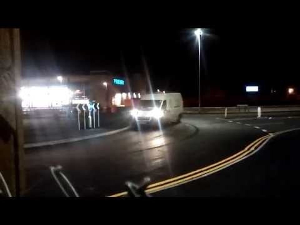 Yodel driver DRIFTS round a roundabout in delivery van