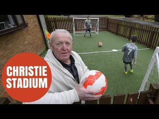 Man builds mini-football stadium in grandsons' front yard so they don't get muddy