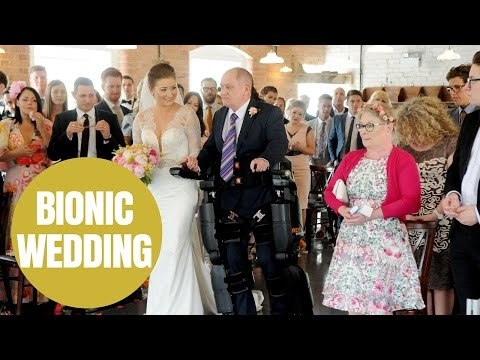 Paralysed dad walks daughter down aisle on wedding day in Derby