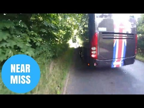Team Sky Bus Nearly Knocks Cyclist Off The Road