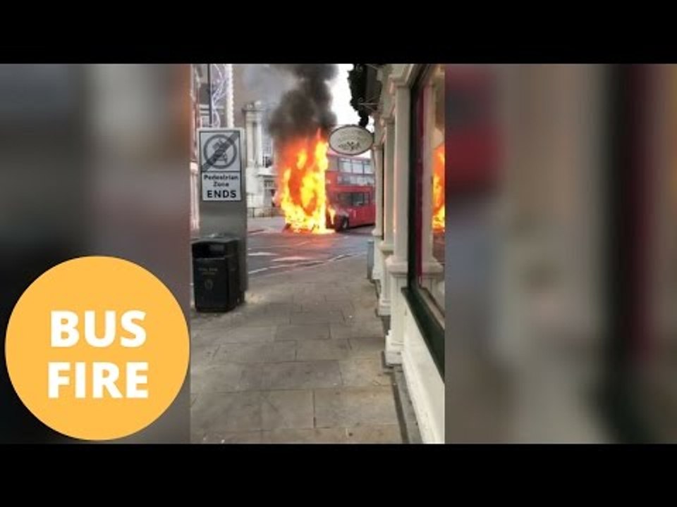 Double decker bus bursts into flames in the middle of a town centre