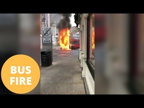 Double decker bus bursts into flames in the middle of a town centre