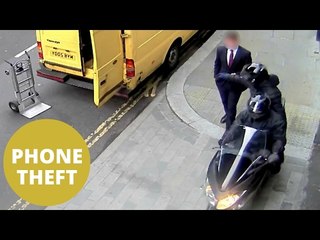 Businessman has phone snatched from hand by masked thief on moped
