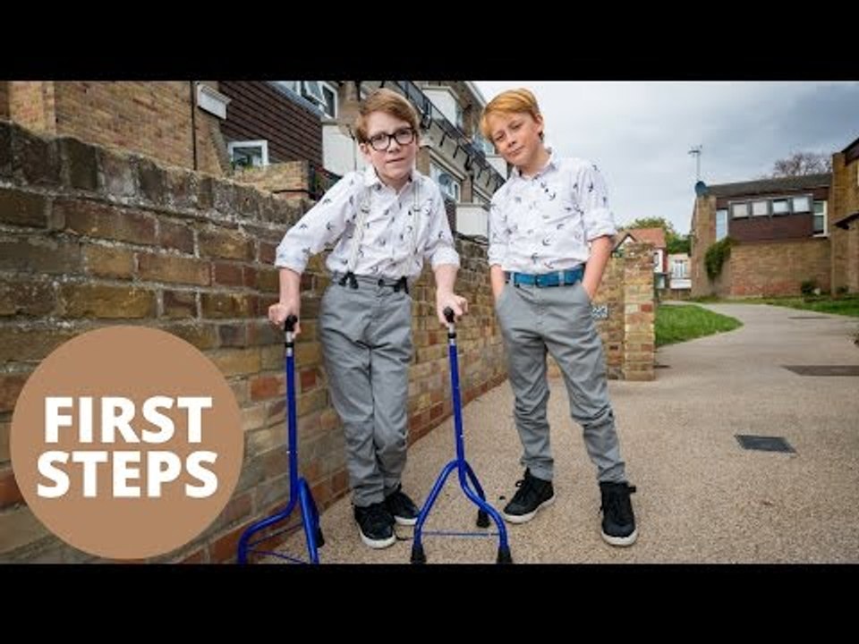 Boy who dreamed of walking alongside his brother takes first steps with him