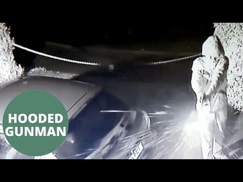 Hooded gunman fires two shots through elderly couple's home