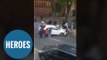 Amazing moment bystanders LIFT a car off a school boy