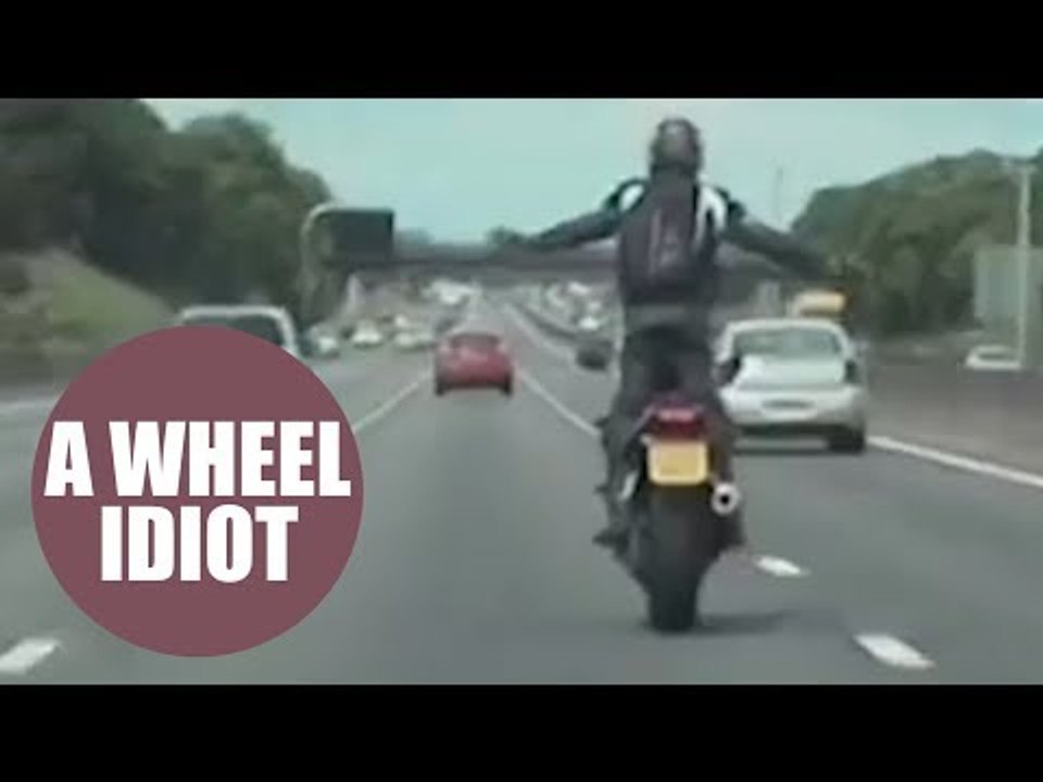 Idiot biker who took SELFIES while pulling wheelies on the motorway jailed for eight months