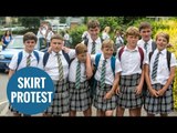 Schoolboys turn up at school in skirts to protest 'no shorts' policy