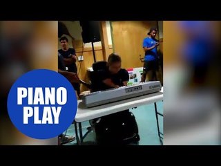 Girl with no arms and legs plays piano in front of a crowd in this emotional clip