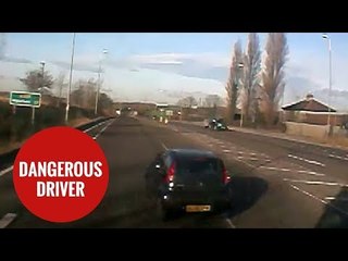 Dramatic dash cam captures car cutting up lorry with inches to spare