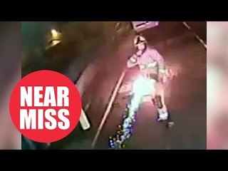 Shocking CCTV shows moment firework misses firefighter by inches after being thrown at him