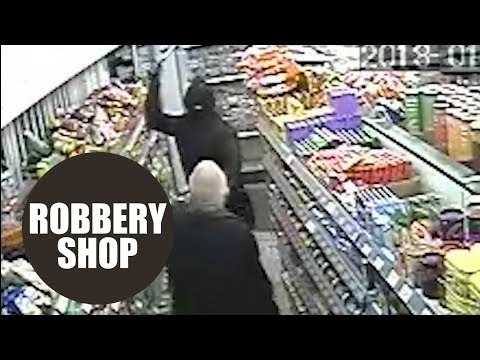 Dramatic CCTV shows have-a-go-hero shopkeeper fighting off robbers with HAMMERS