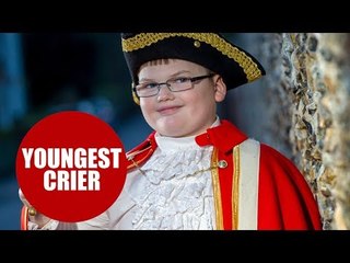 A boy scout is proud to be the world's youngest town crier - at the age of 11