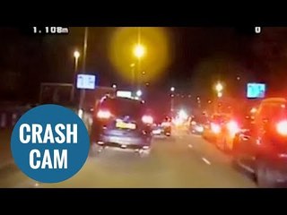 Banned driver caught on dash ramming police car