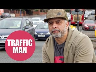 Dad captured on camera directing traffic at one of Europe's busiest junctions