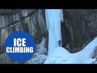 Fearless climber becoming the first person in the world to ascend a 300m frozen waterfall