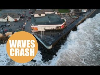 Dramatic footage shows youngsters being washed up in massive waves