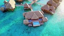 Flying over the St Regis Resort luxury overwater bungalow in Bora Bora