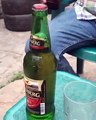 Nigerian Man With Giant Fingers Pops Open A Beer Bottle With His Bare Hands